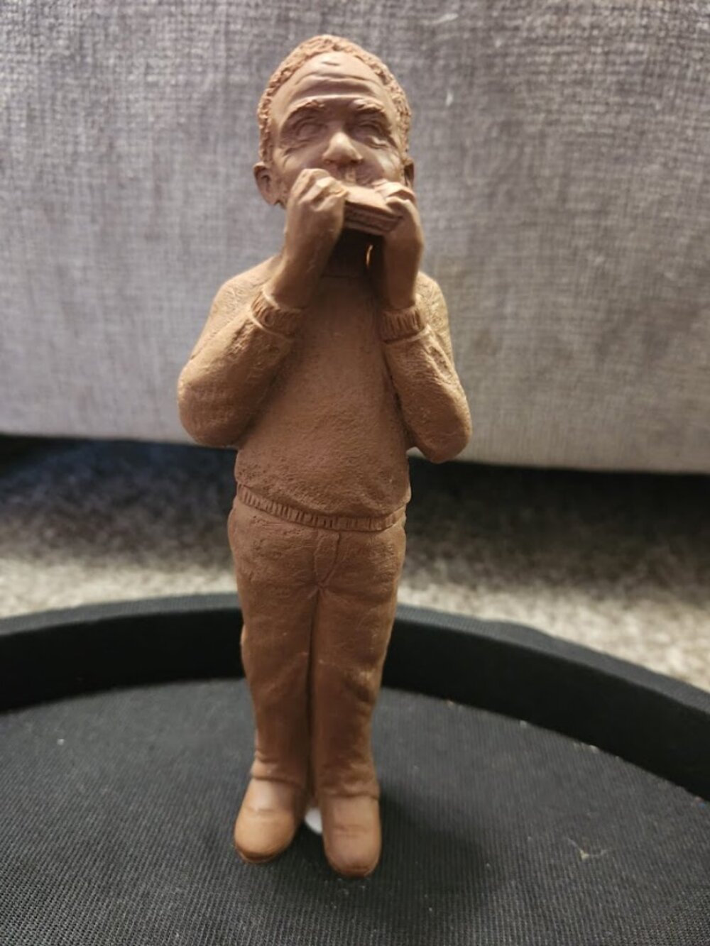 Harmonica Player" from the 1991 TnT folk art series